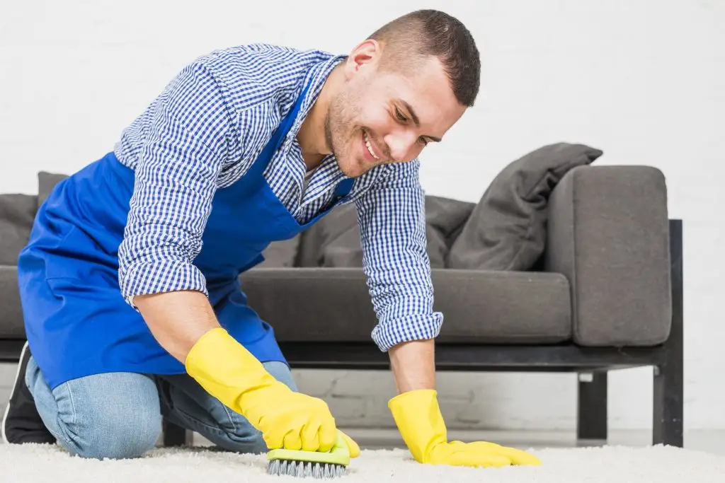 man-cleaning-his-home Infera cleaning Chicago