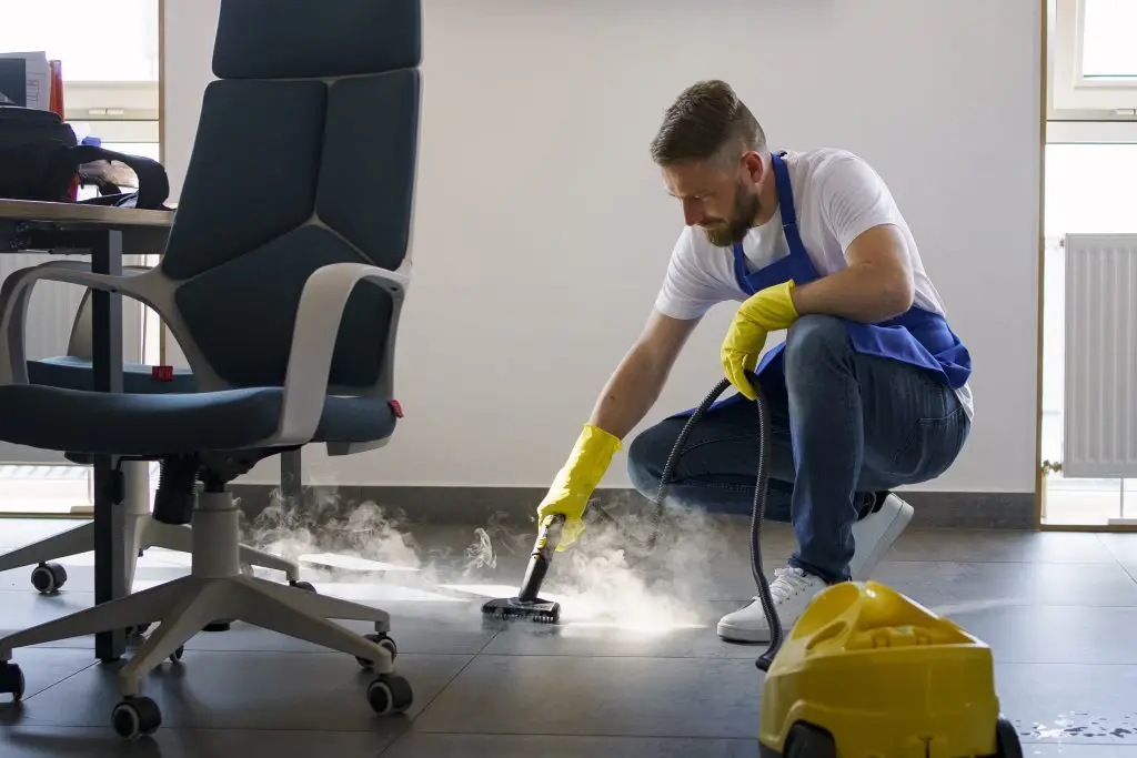 professional-cleaning-service-person-using-steam-cleaner-office close-up-man-cleaning-his-house man-cleaning-his-home Infera cleaning Chicago